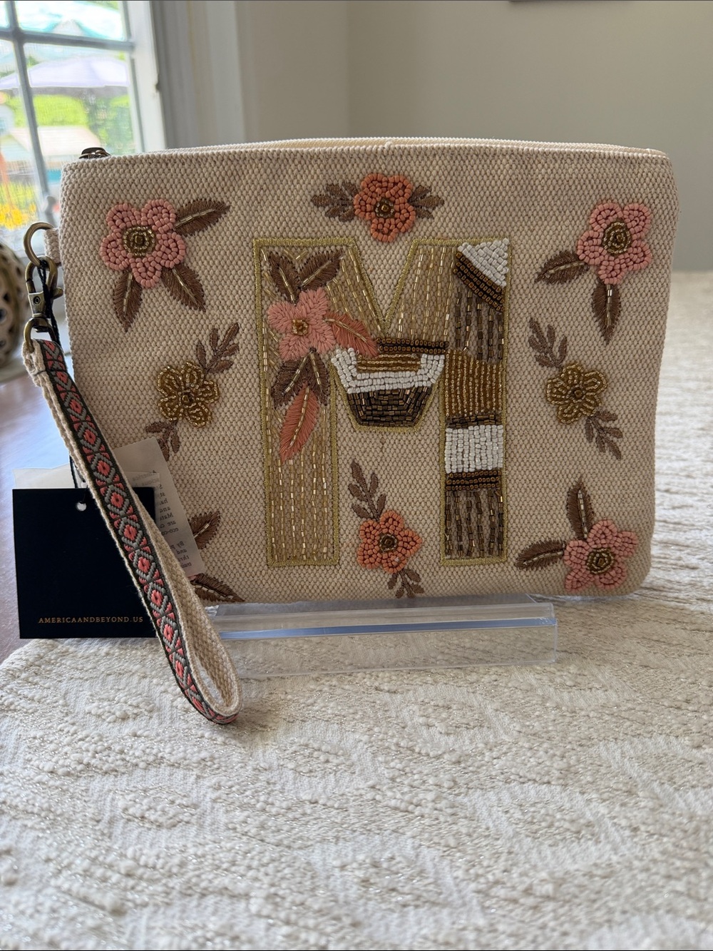 America & Beyond NWT Beige with Embroidered Floral Wristlet
